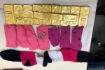 woman held with gold, hyderabad airport checking, woman held with 11 kg gold hidden in her specially made cloth pockets and socks at hyderabad airport, Indian currency
