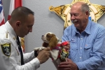 puppy, sheriff, dog attacked and rescued from alligator honored as deputy dog, Old dog