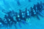 Guinness world record, NRI and team break Guinness world record for the longest human chain underwater, nri and team creates guinness world record, Scuba diver