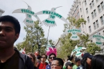 May day celebrations, Oakland May day celebrations, hundreds of people march in oakland celebrates may day, International workers day