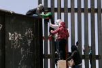punjabis Crossing Border Fence, punjabis crossing US mexico border, video clip shows punjabi women children crossing border fence into u s, Punjabis