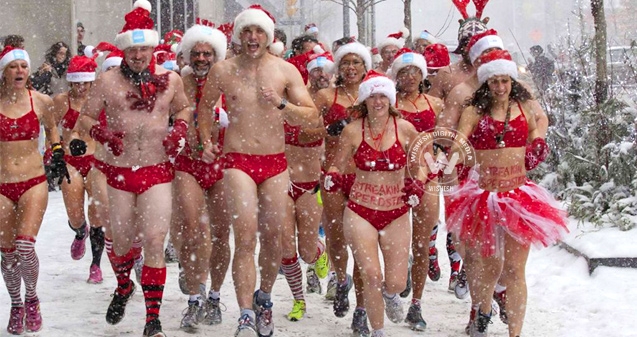 Fundraisers brave cold for charity run in swimsuit },{Fundraisers brave cold for charity run in swimsuit 
