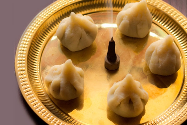 Welcome Ganapati home with semolina modaksWelcome Ganapati home with semolina modaks