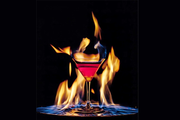 Man's face catches fire by flaming cocktail},{Man's face catches fire by flaming cocktail