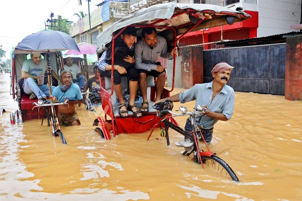 Assam deluged!},{Assam deluged!