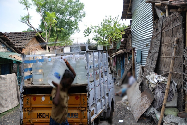 Mineral water to Slum areas},{Mineral water to Slum areas